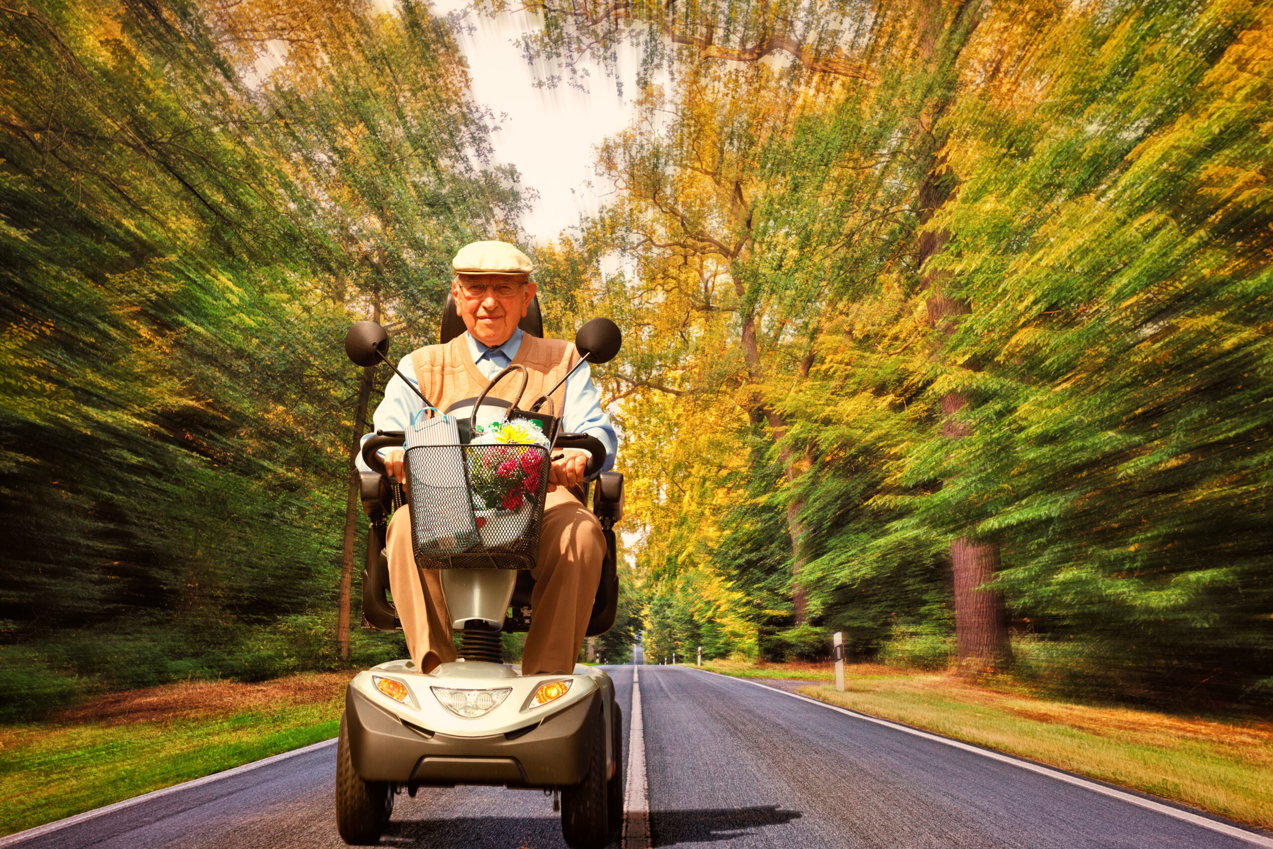 Elderly Person On Electromobile