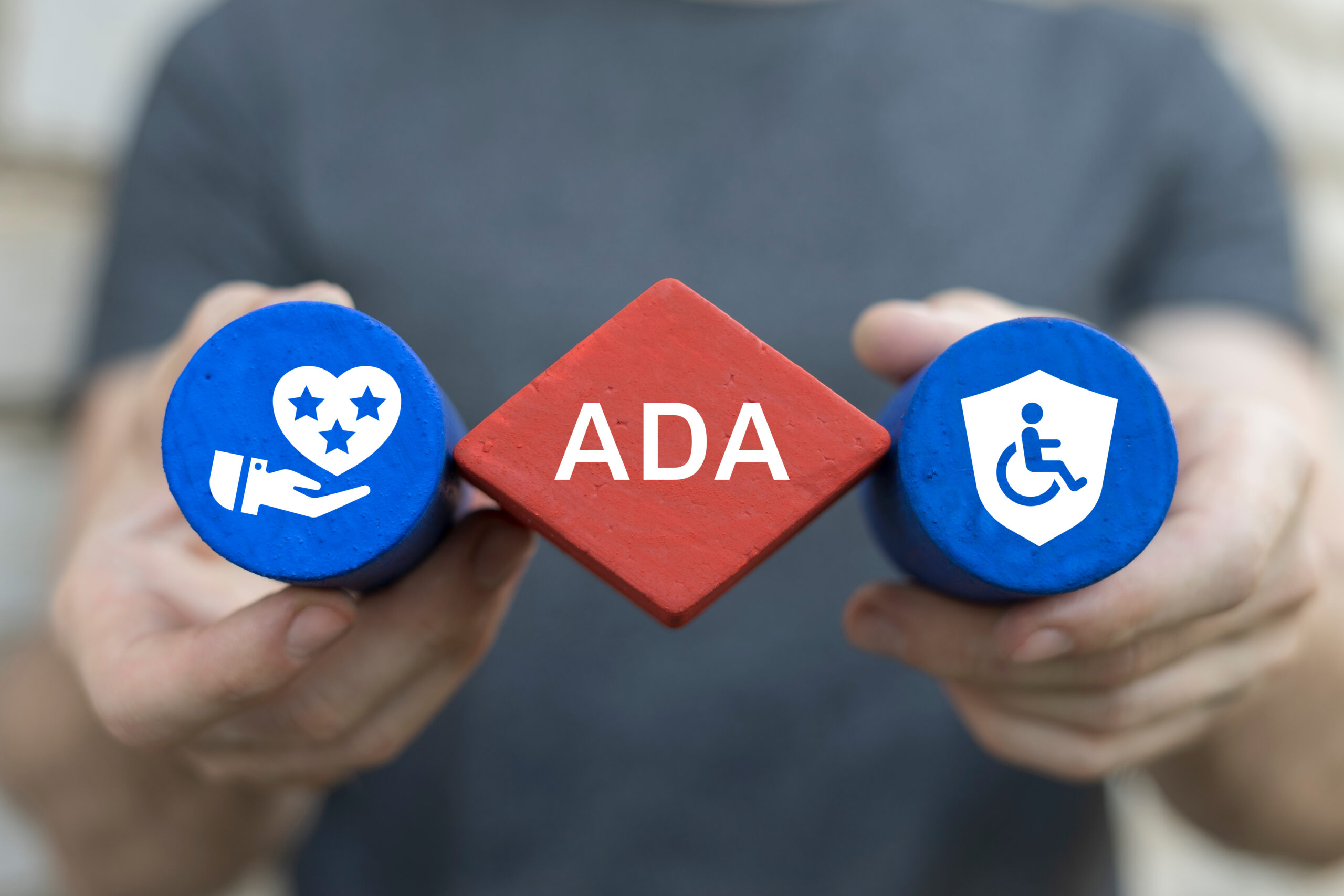 Man Holding Blocks With Icons Sees Abbreviation: Ada Ada Americans With Disabilities Act Concept Disability Law Social Services